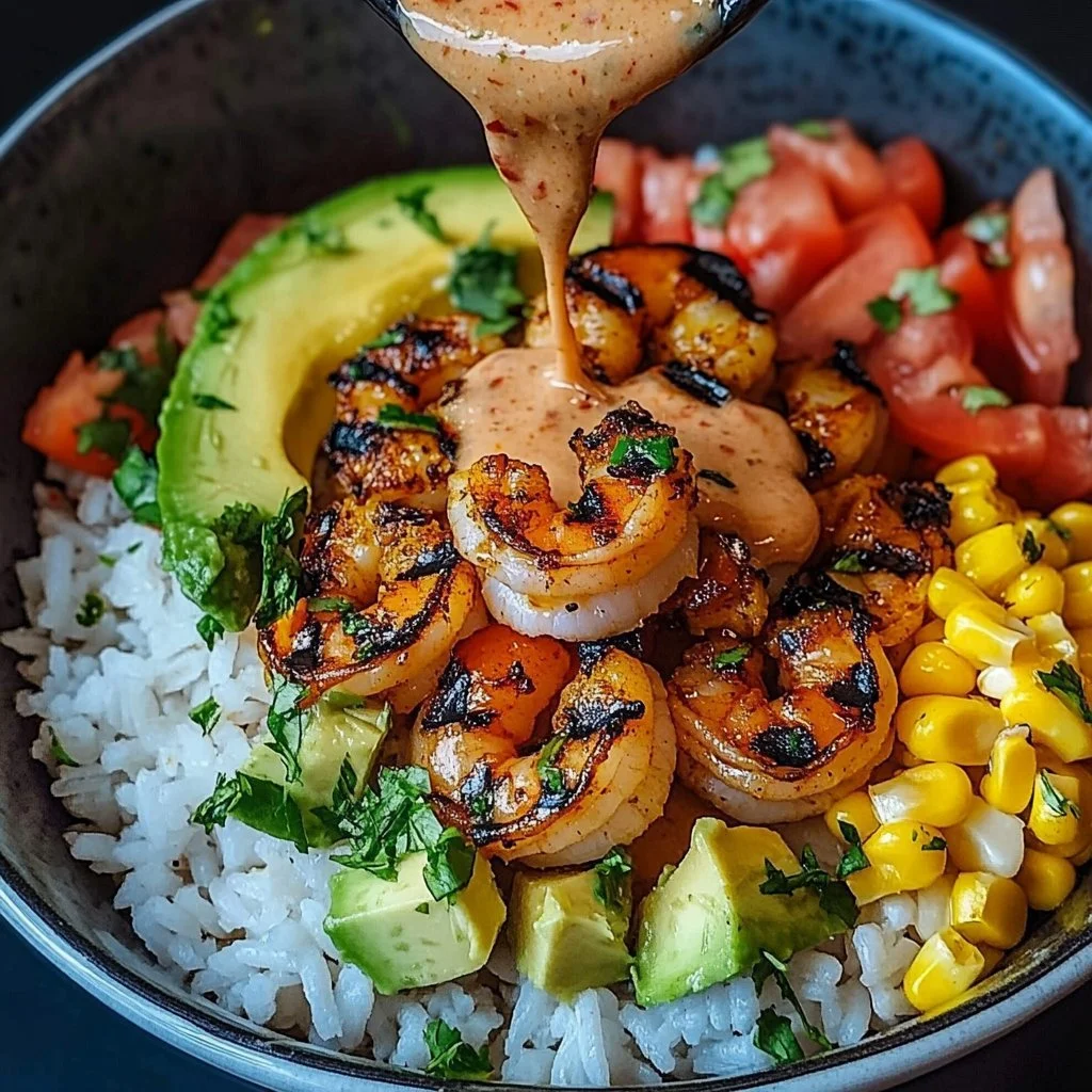 Grilled shrimp bowl with avocado and corn salsa on a plate