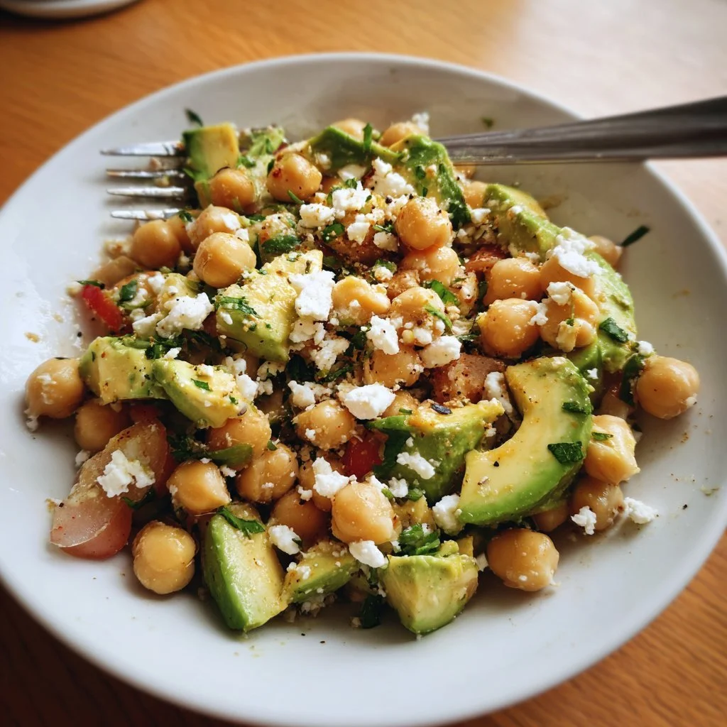 Chickpea Feta Avocado Salad with fresh ingredients in a bowl